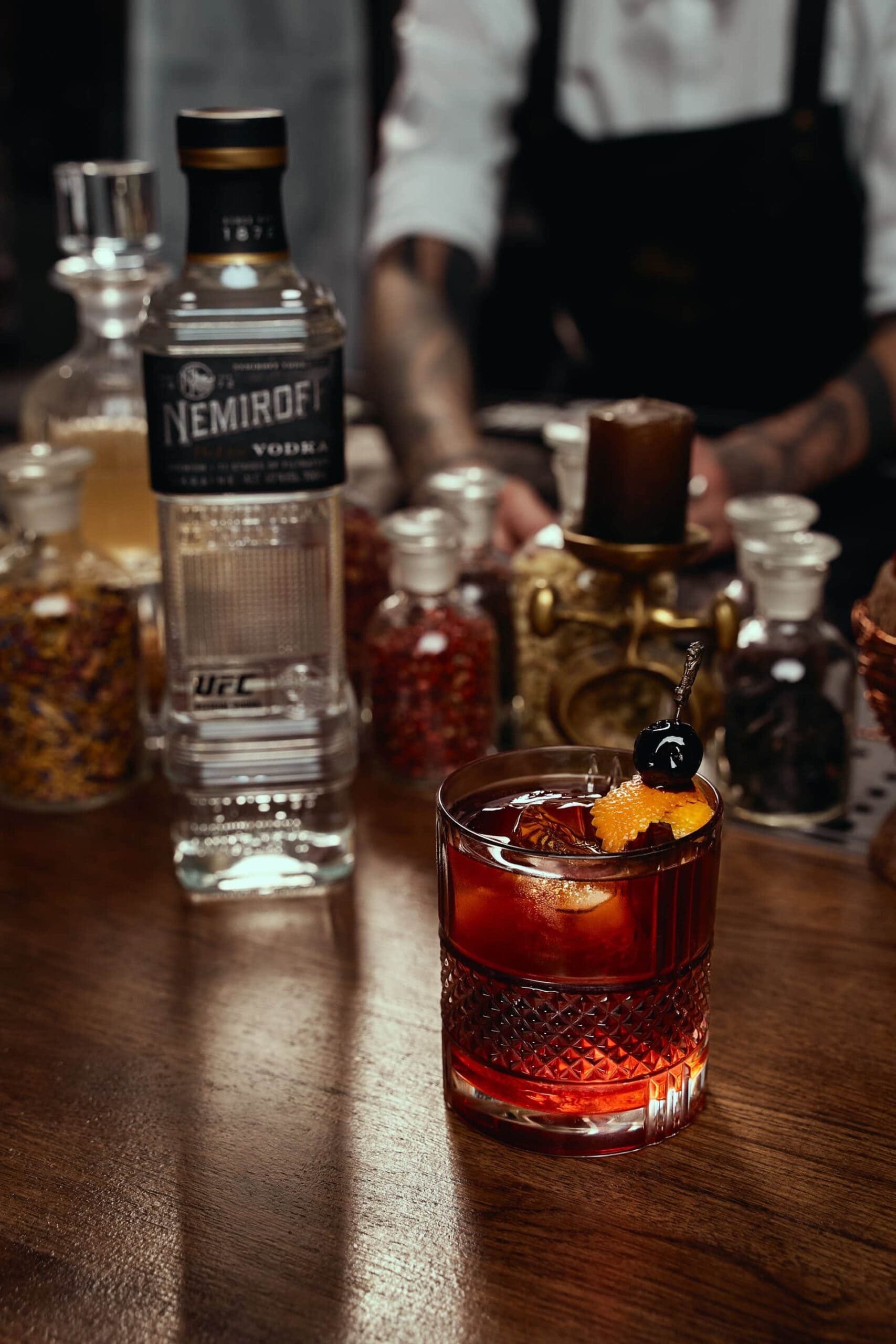 Nemiroff Negroski cocktail beside a bottle of Nemiroff vodka